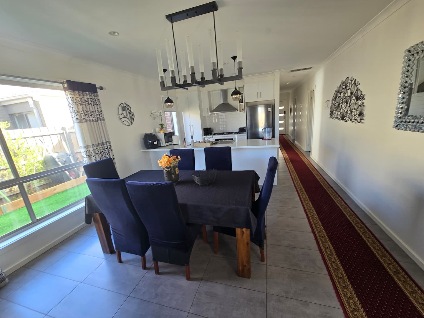 Dining table and open kitchen at the Robinson home